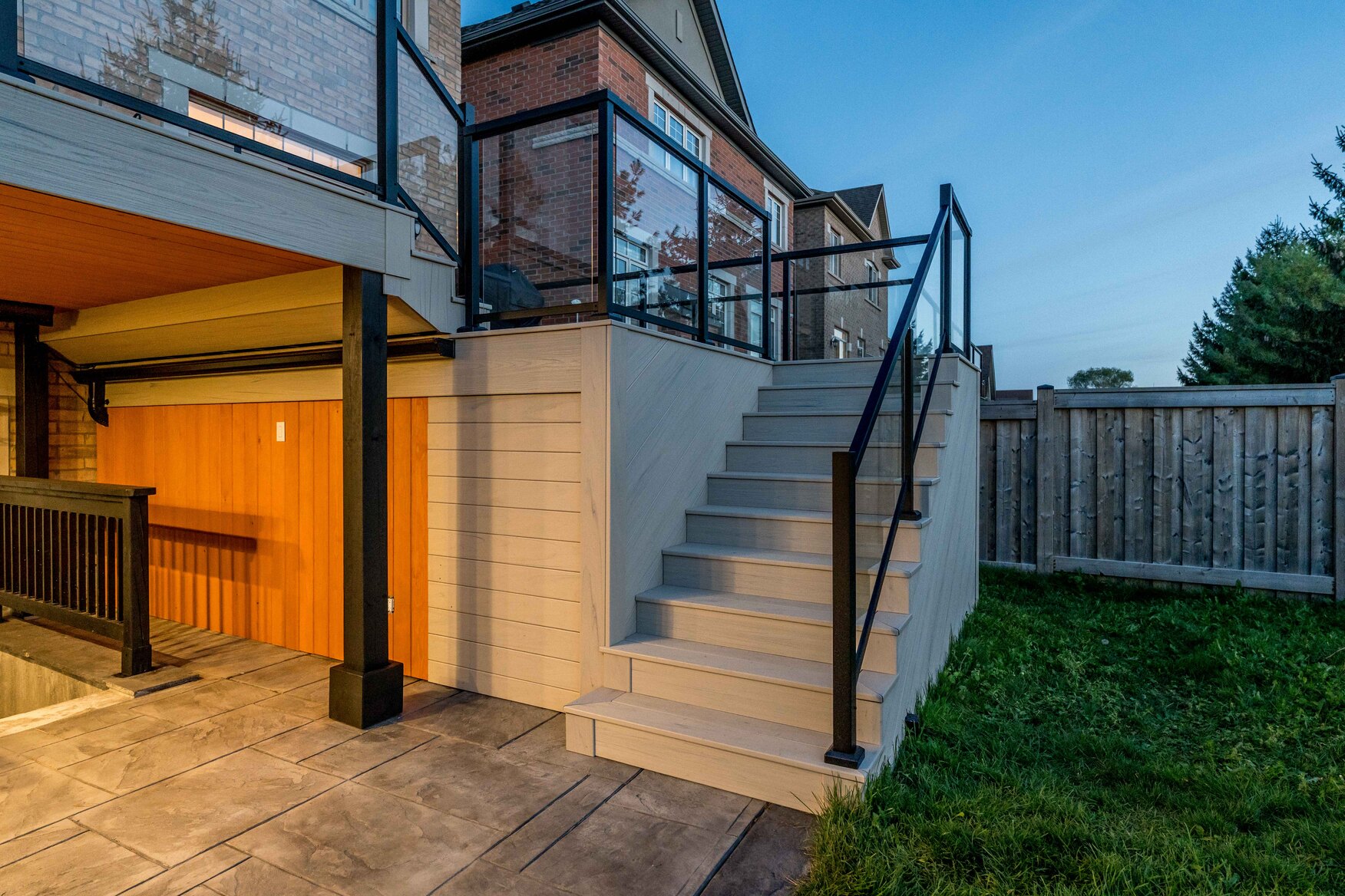 Composite staircase coming down from two tier deck